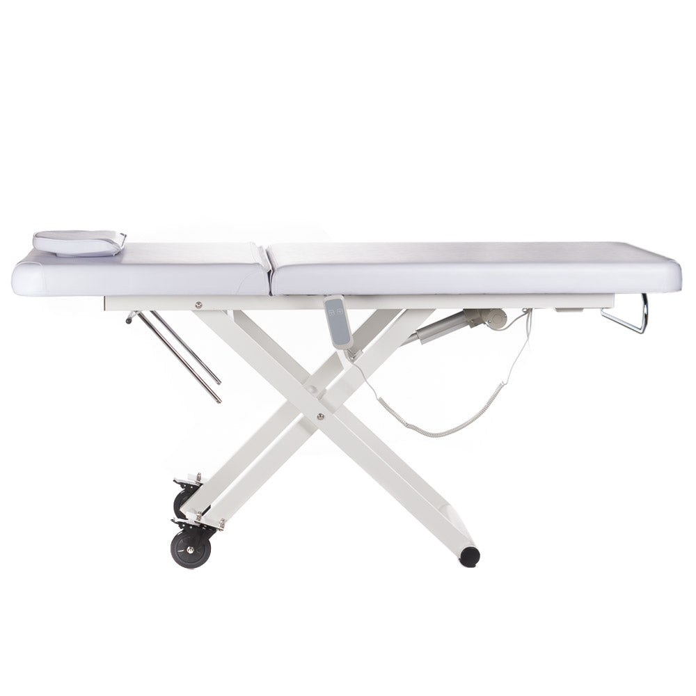 White electrical rehabilitation table BY-1041 by Beauty System with padded surface and adjustable features for therapy sessions.