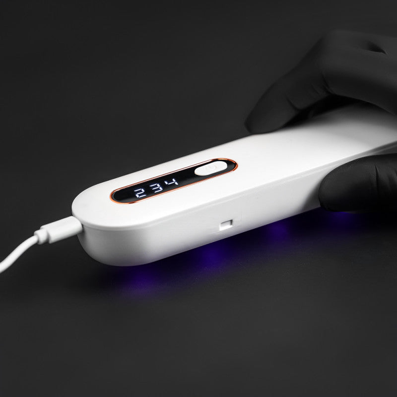 BVShop UV sterilizer for tattoo machines, compact device with digital display and sterilization chamber for safe tattoo equipment.