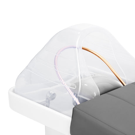 Gabbiano Head Spa 017 grey hair washing bed with cushioned surface and adjustable headrest for comfortable hair treatments.