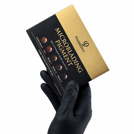PhiBrows SUPER Microblading Pigment Collection 5x5ml — pigment collection box held in a gloved hand