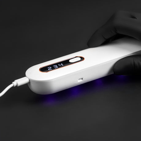 BVShop UV sterilizer for tattoo machines, compact device with digital display and sterilization chamber for safe tattoo equipment.